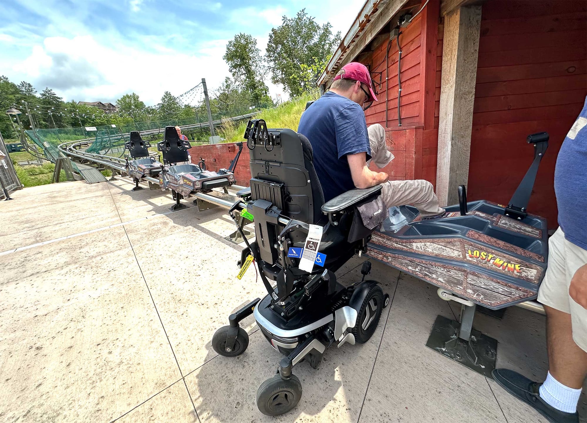 John transferring out of coaster after ride.