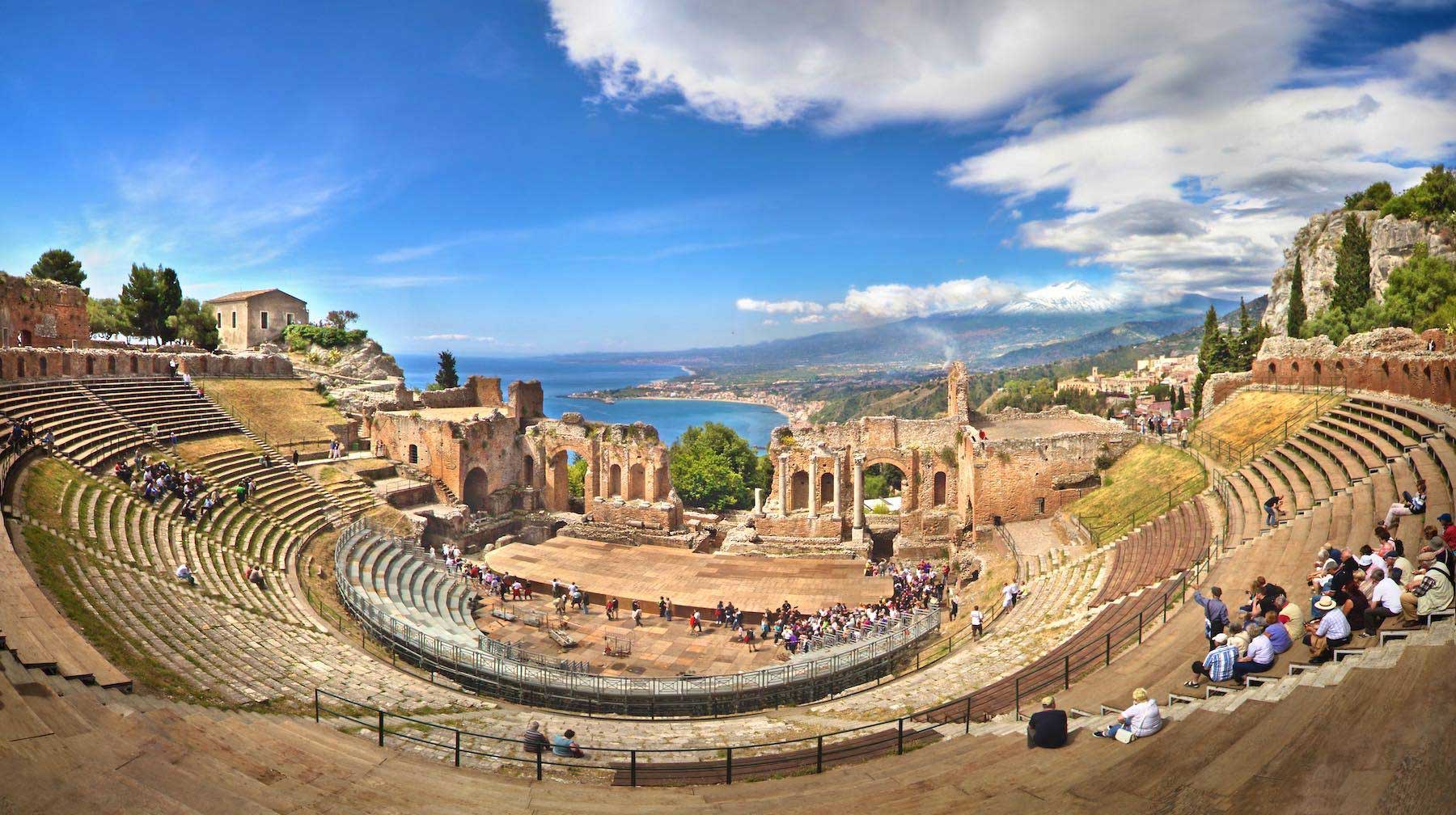 Theatre seating bowl built into the side of a natural hill.