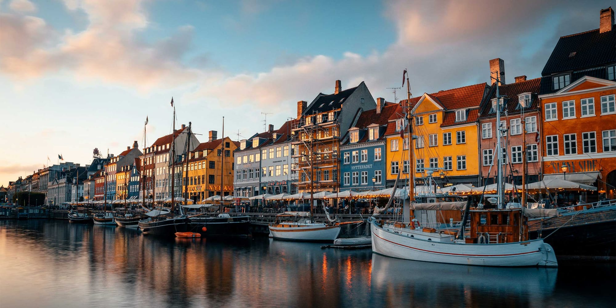 Colorful houses along canal in Copenhagen, Denmark.