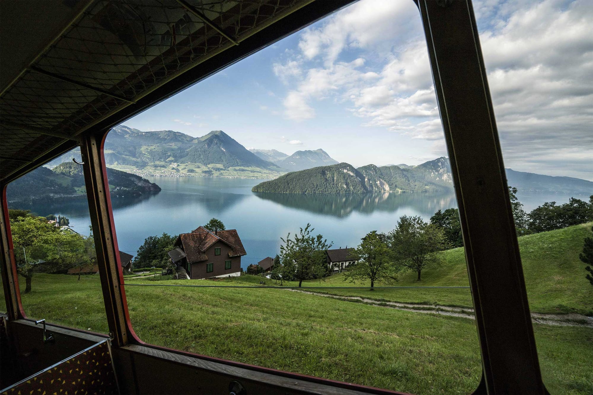 Lake Lucerne viewed from the window of a train.
