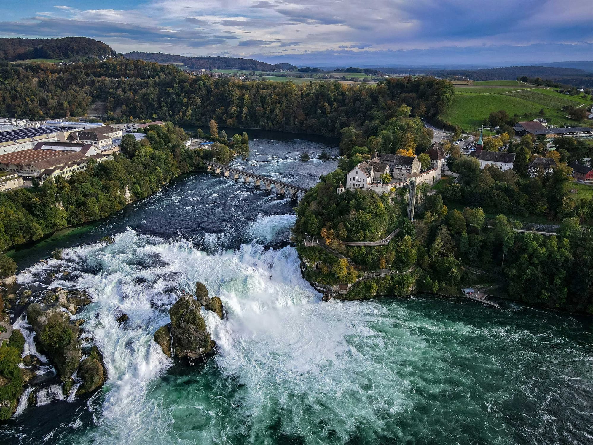 Aerial view of waterfall and rapids.