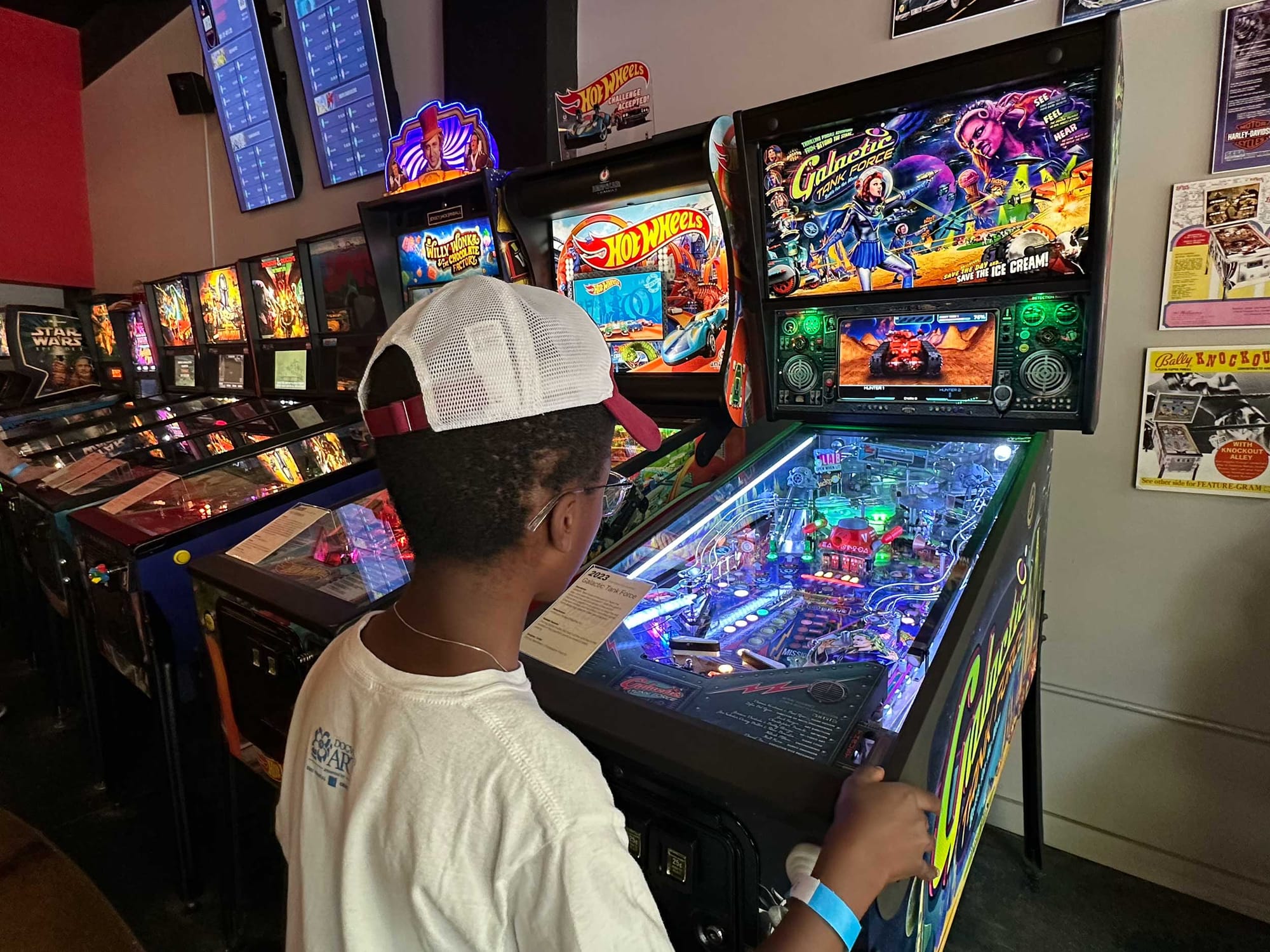 Robert playing pinball.