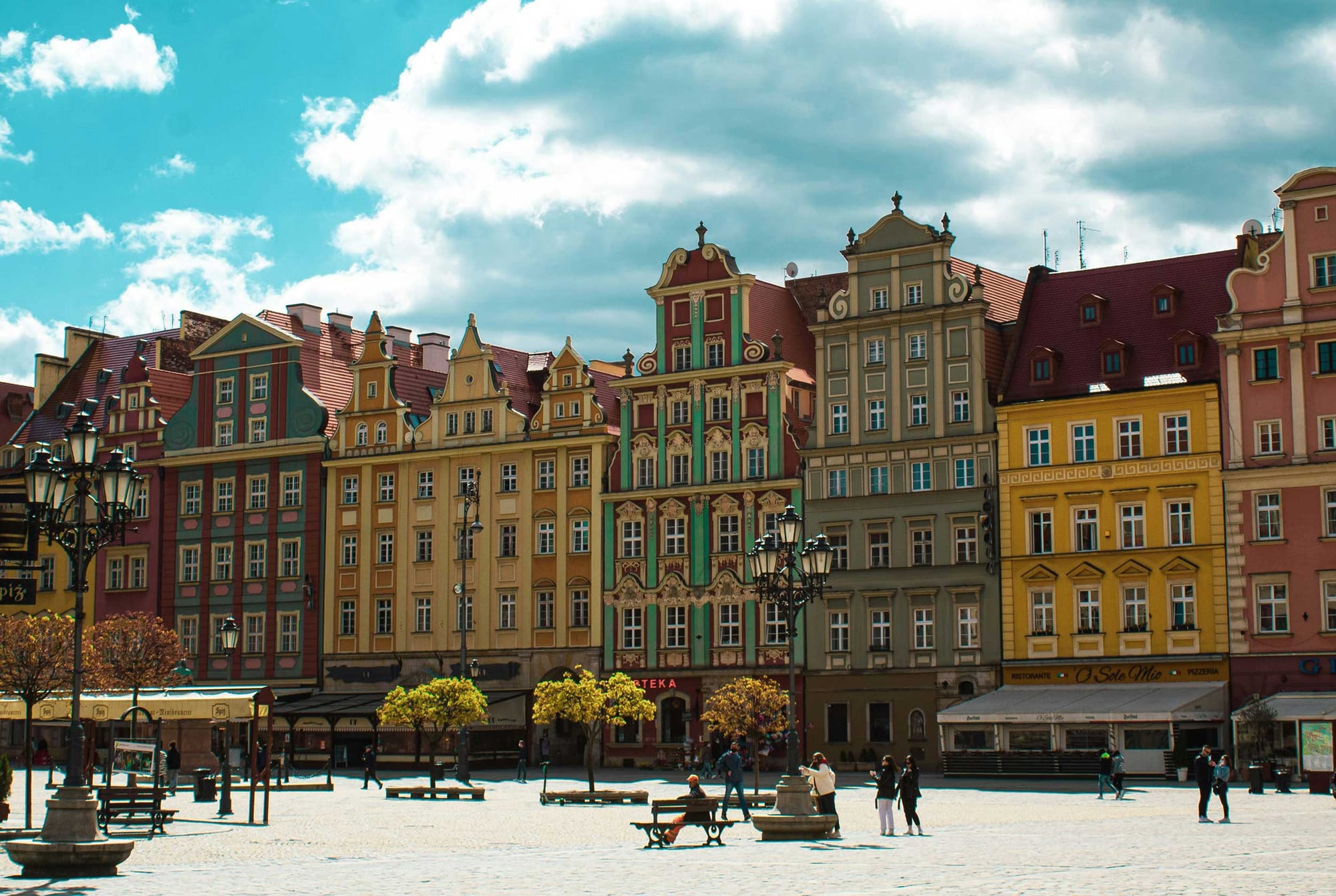 Colorful buildings in historic city square.