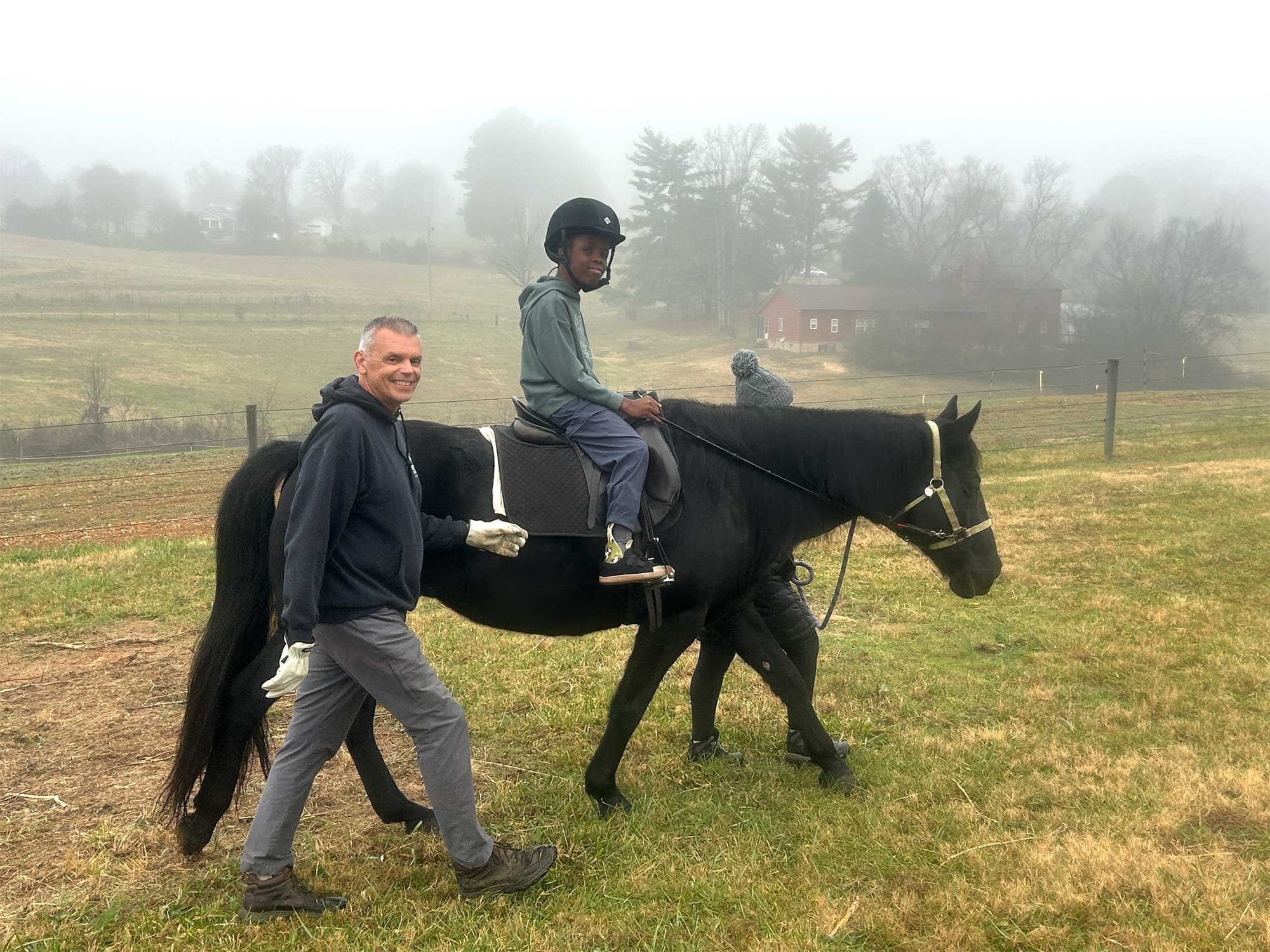 Robert pictured on horseback on a foggy morning.