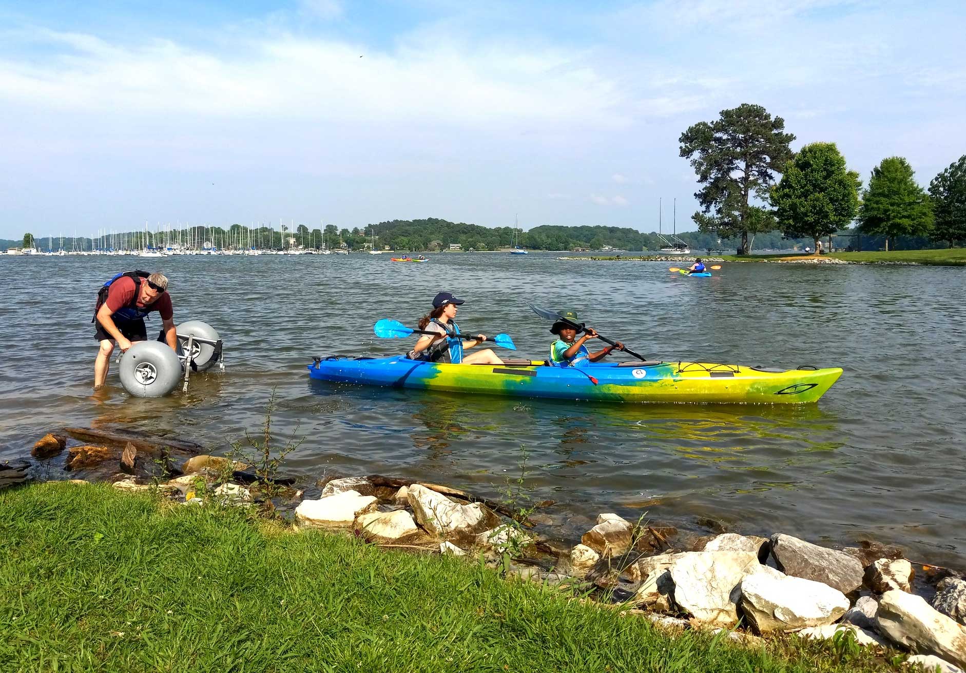Multiple kayaks in the water.