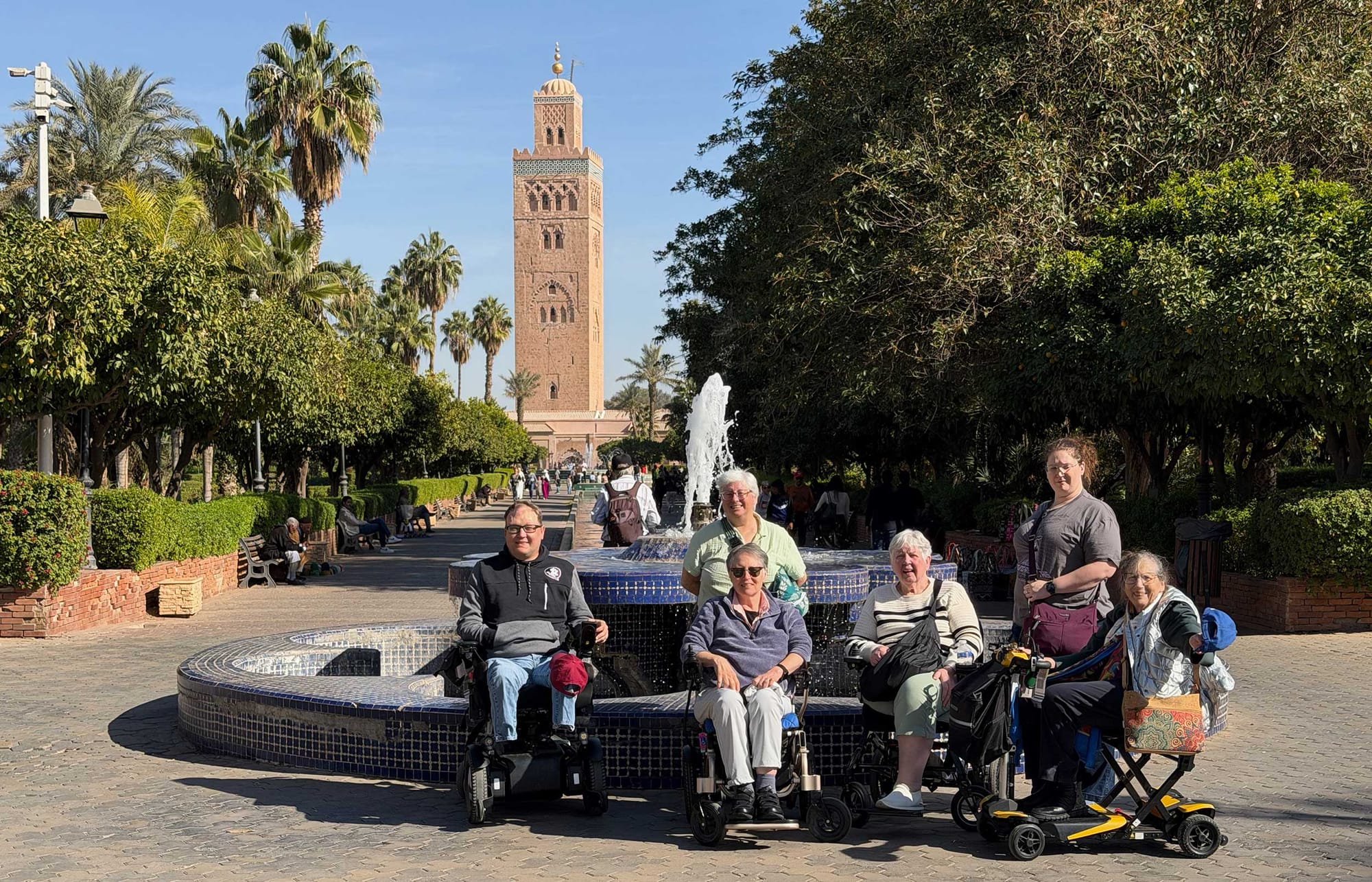 John with a group of travelers in Morocco.