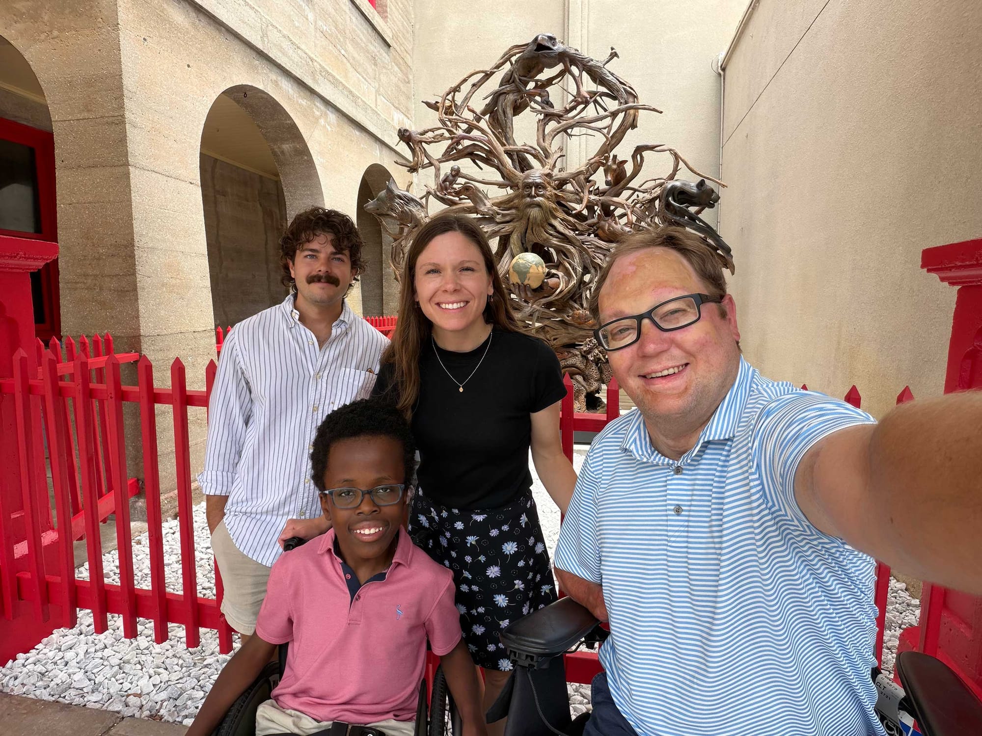 Selfie of John, Stevie, Robert and another family member outside of Ripley's Believe It Or Not.
