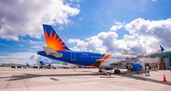Allegiant Air Airbus A320 parked at gate at Knoxville Airport.