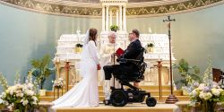 John and Stevie on the altar at their church, preparing to wed.