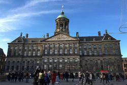 PHOTO DESCRIPTION: The Royal Palace of Amsterdam, as seen from Dam Square.