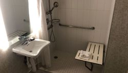 Roll-in shower at a hotel.