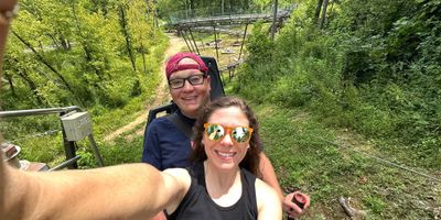 Selfie of John and Stevie riding mountain coaster in Pigeon Forge.