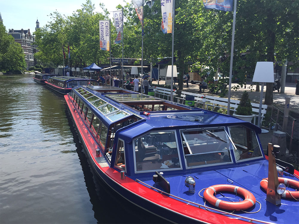 Blue Boat Amsterdam Canal Cruise Boats & Dock