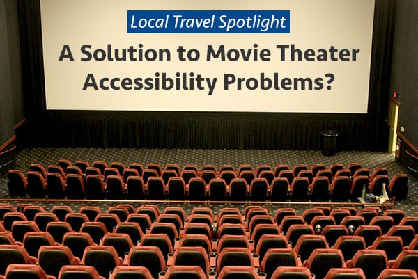 Photo Description: Photo taken from the top row of a movie theater, showing the stairs down to the entrance and the wheelchair space at the very front of the auditorium.