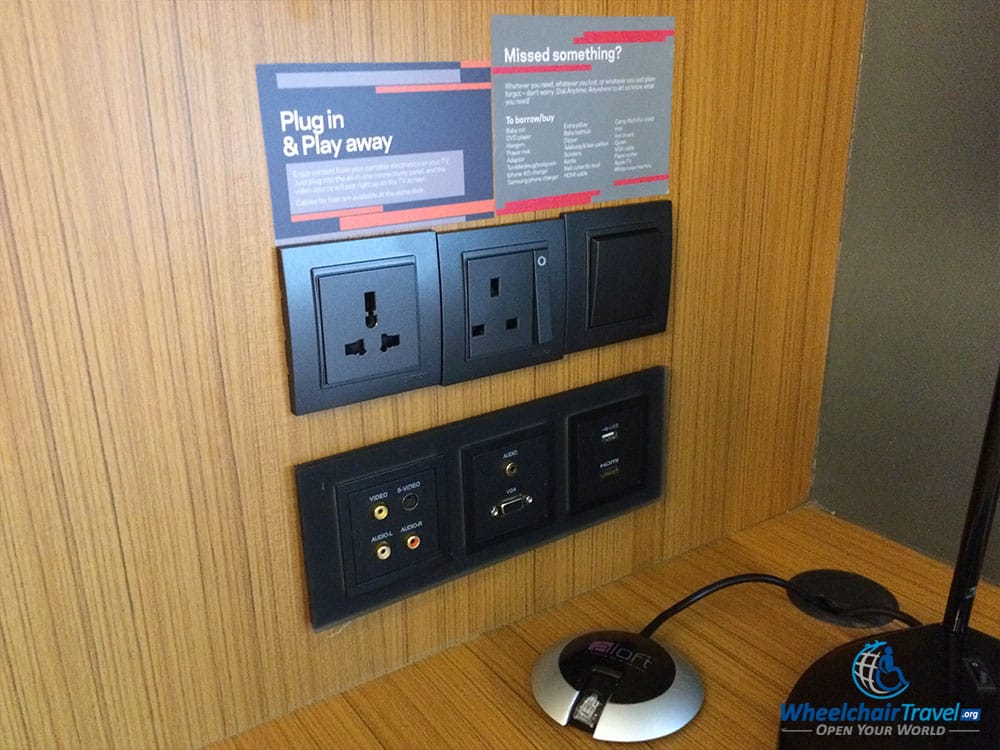 PHOTO DESCRIPTION: Audio, visual and power outlets on a wall at the Aloft Kuala Lumpur Sentral Hotel.