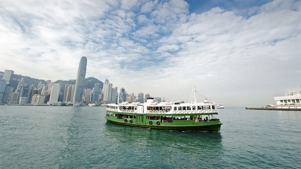 Star Ferry crossing Victoria Harbour in Hong Kong, China.