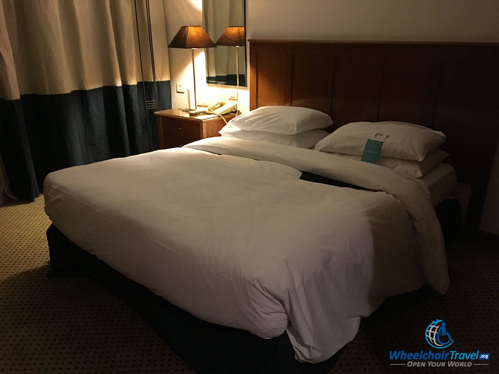 Bed in a wheelchair accessible hotel room at Le Méridien Pyramids Hotel & Spa