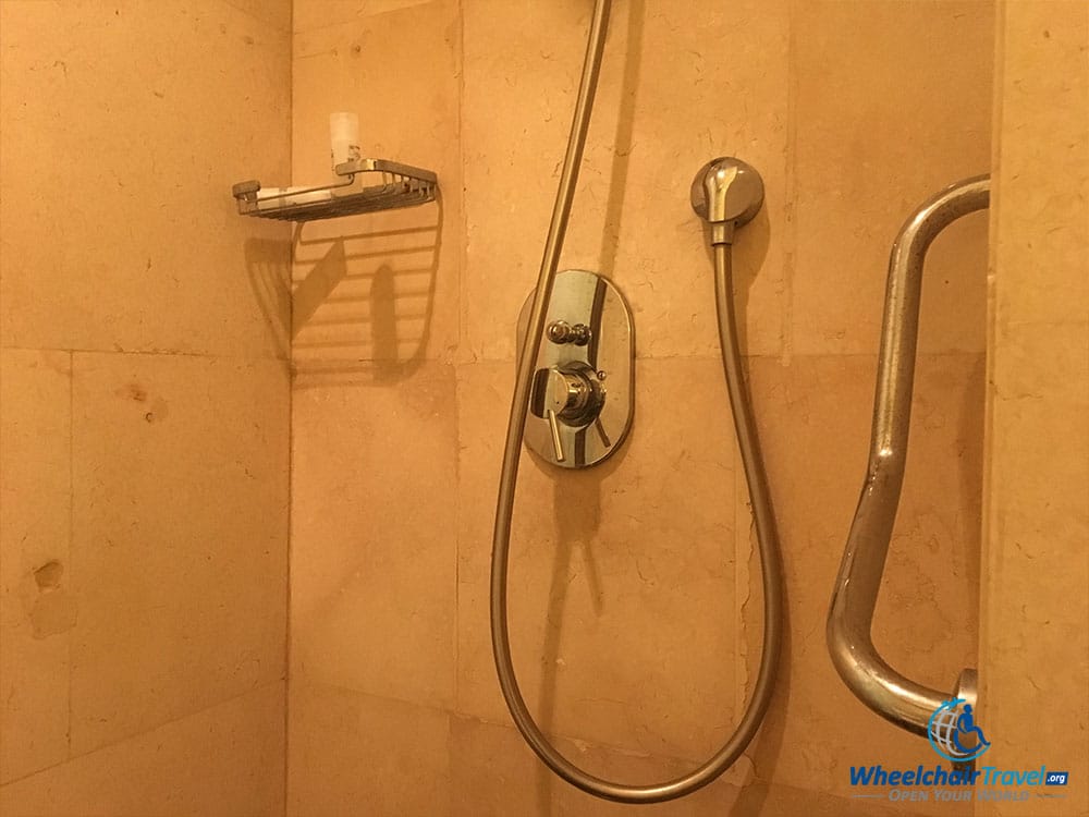 Walk-in shower water controls