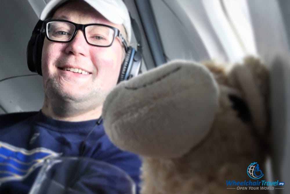 Rocking my Bose QC 25 headphones on a flight.