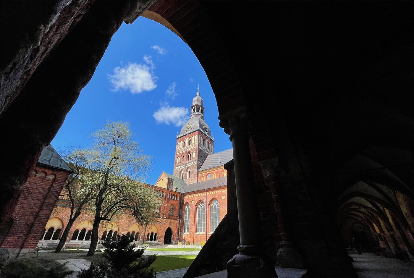 Riga Cathedral building seen through an arch.