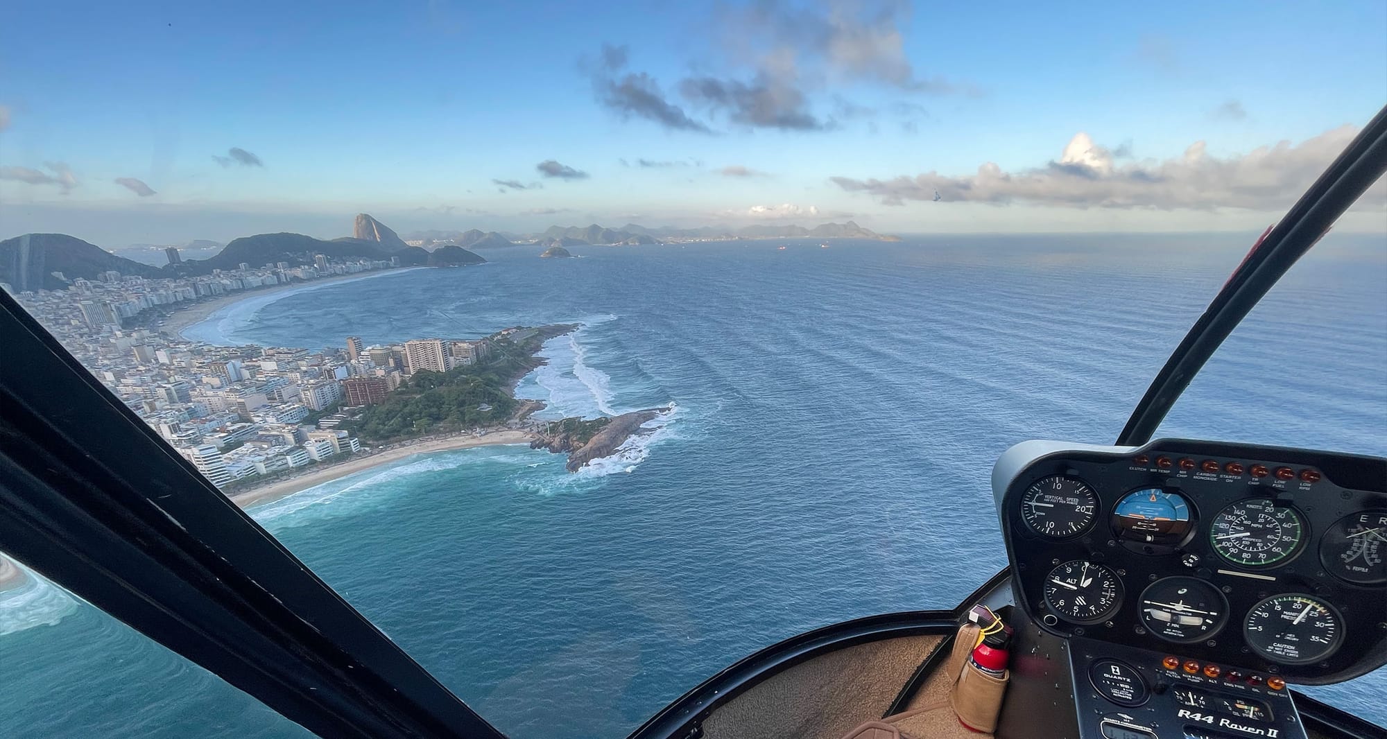 Rio de Janeiro coastline seen through window of helicopter.