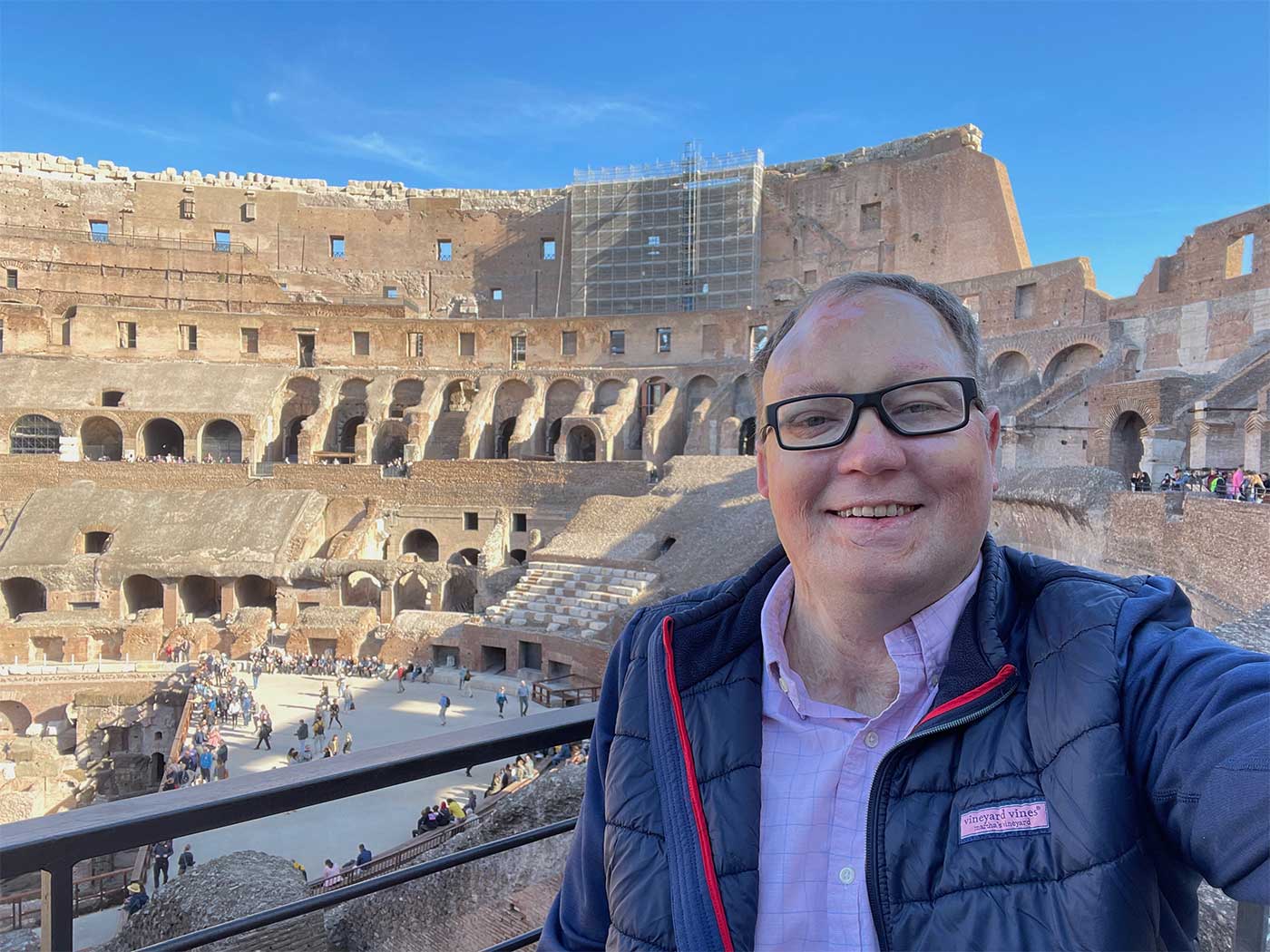 Selfie of John looking over the arena bowl and excavations.