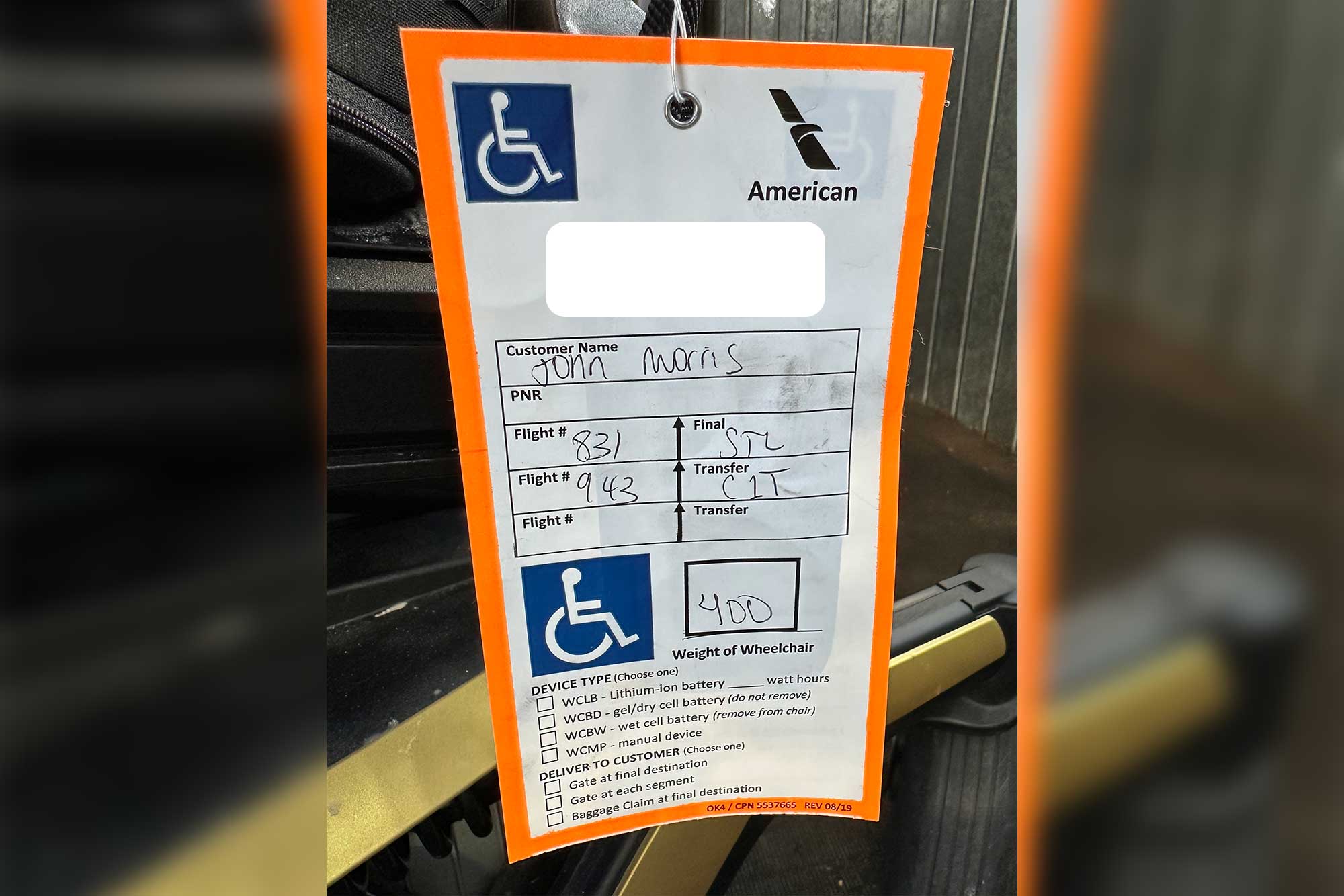 American Airlines wheelchair luggage tag.