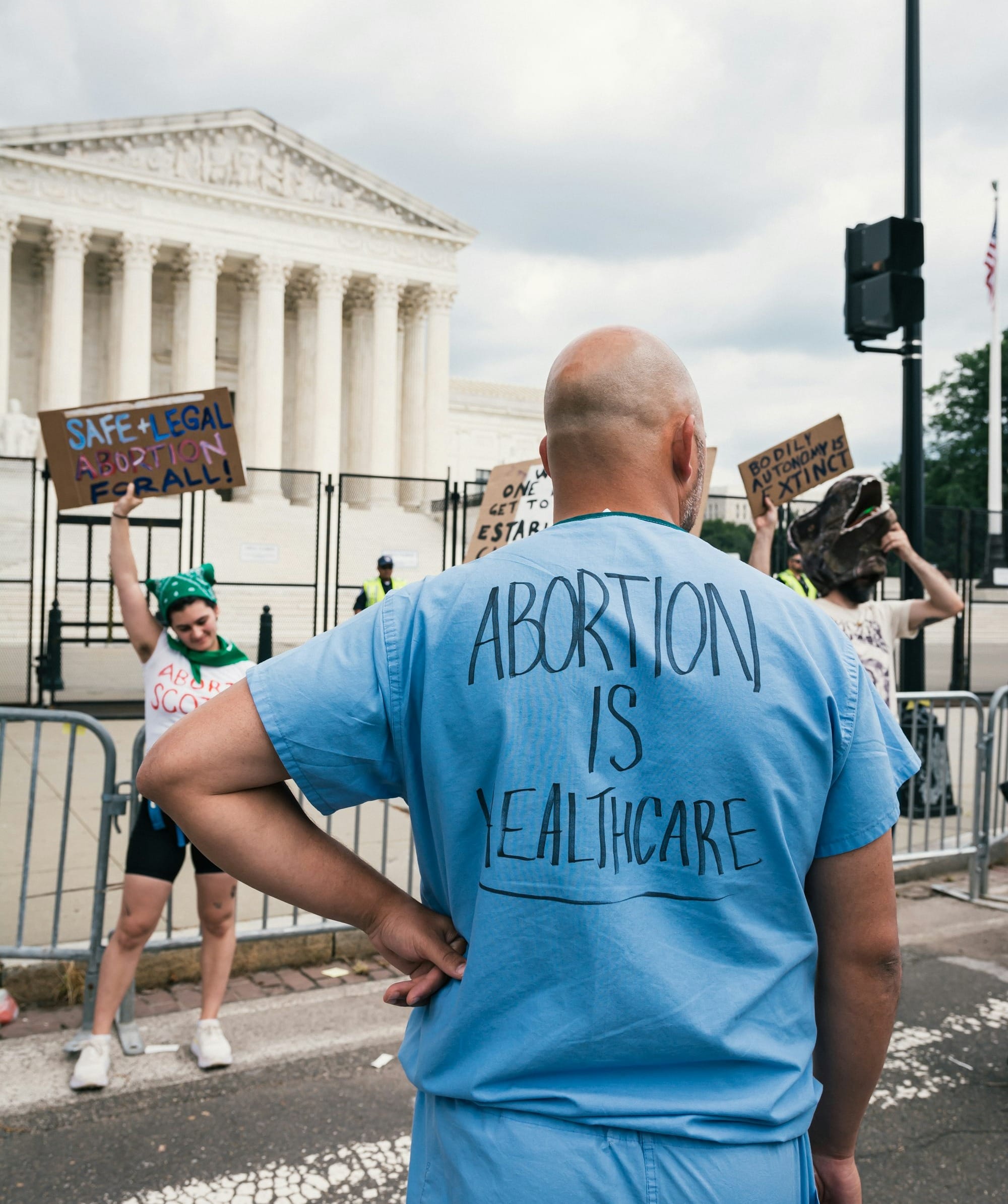 a man holding a sign