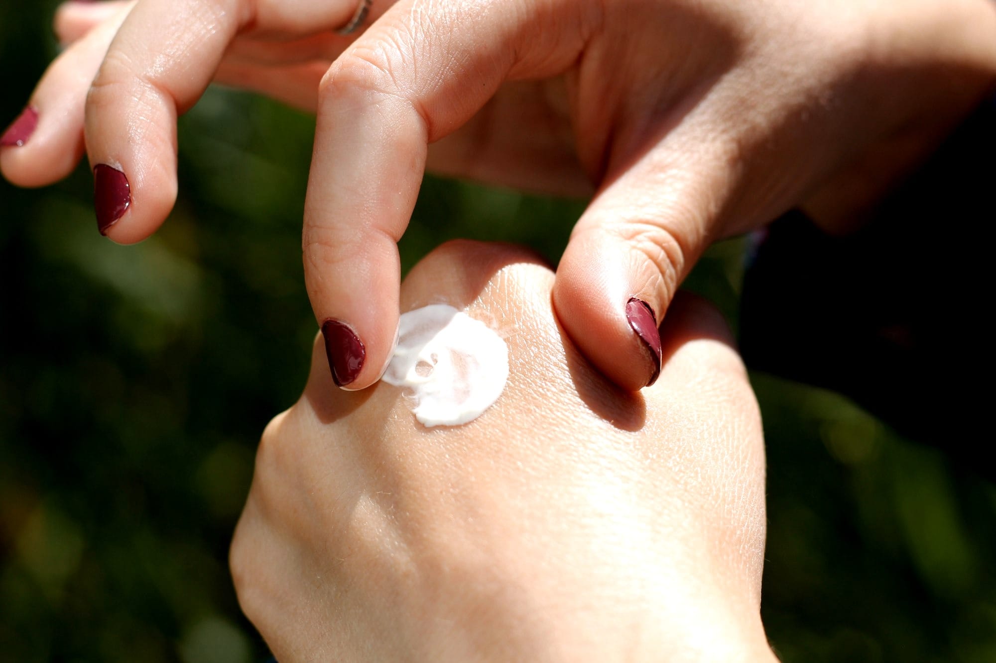 person with white nail polish