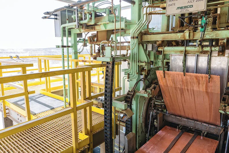Copper sheets at industrial handling equipment in Gunnison’s gallery of first copper from run-of-mine material.