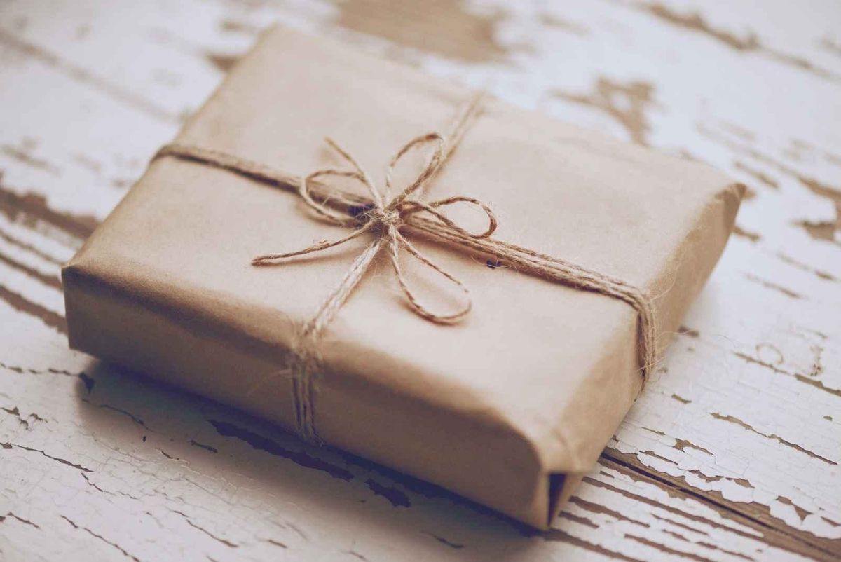 gift made of wood lying on rugged wood representing why bad things happen to good people