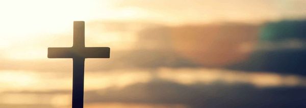 Cross of Jesus in the sunlight.  Hope for why bad things happen to good people.