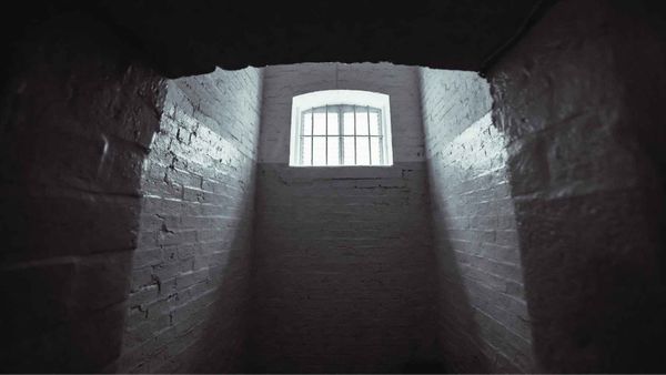 prison cell with light representing why bad things happen to good people