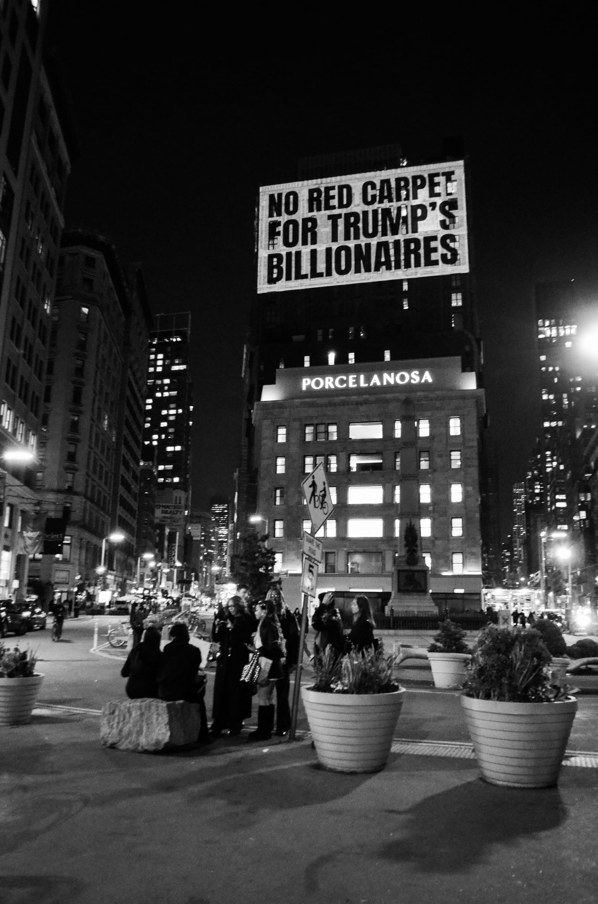 Met Gala Boycott Message Projected on Bezos’s Manhattan Penthouse