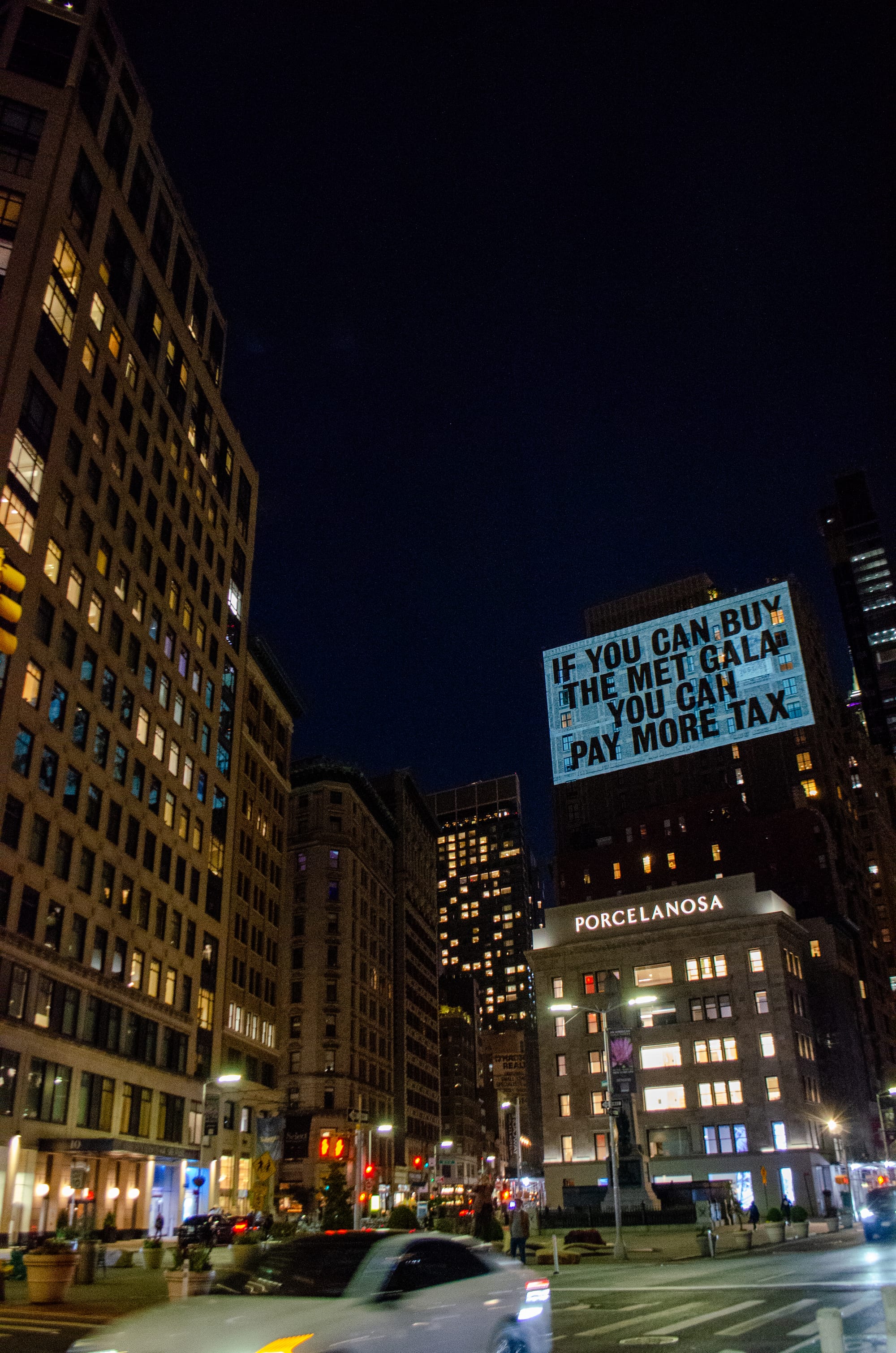 Met Gala Boycott Message Projected on Bezos’s Manhattan Penthouse