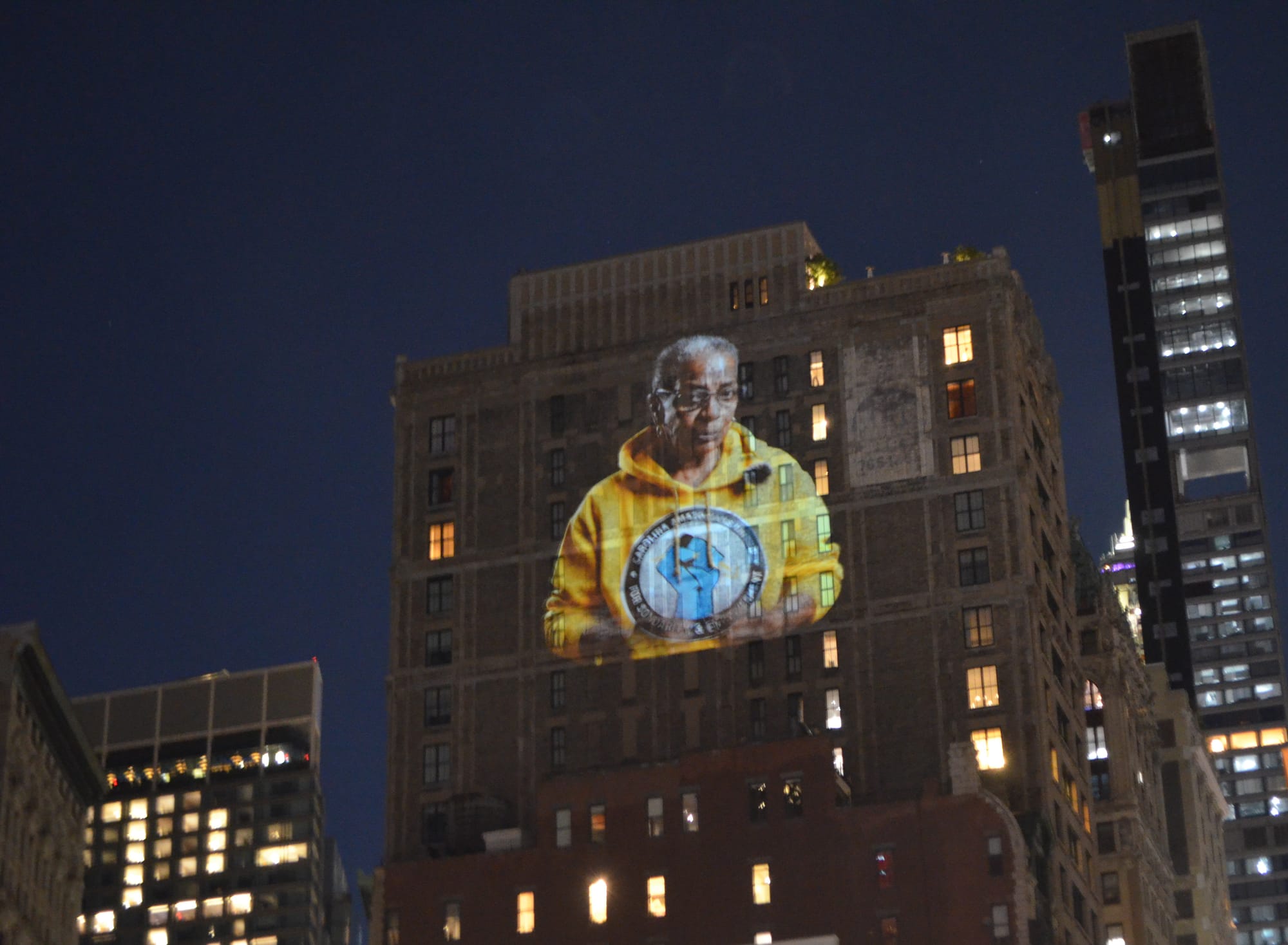Met Gala Boycott Message Projected on Bezos’s Manhattan Penthouse