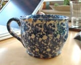 Mug I bought in 1993 (the summer before going away to college) made by the Lalish's, potters in my hometown. It only has one chip though I have used it every day since.