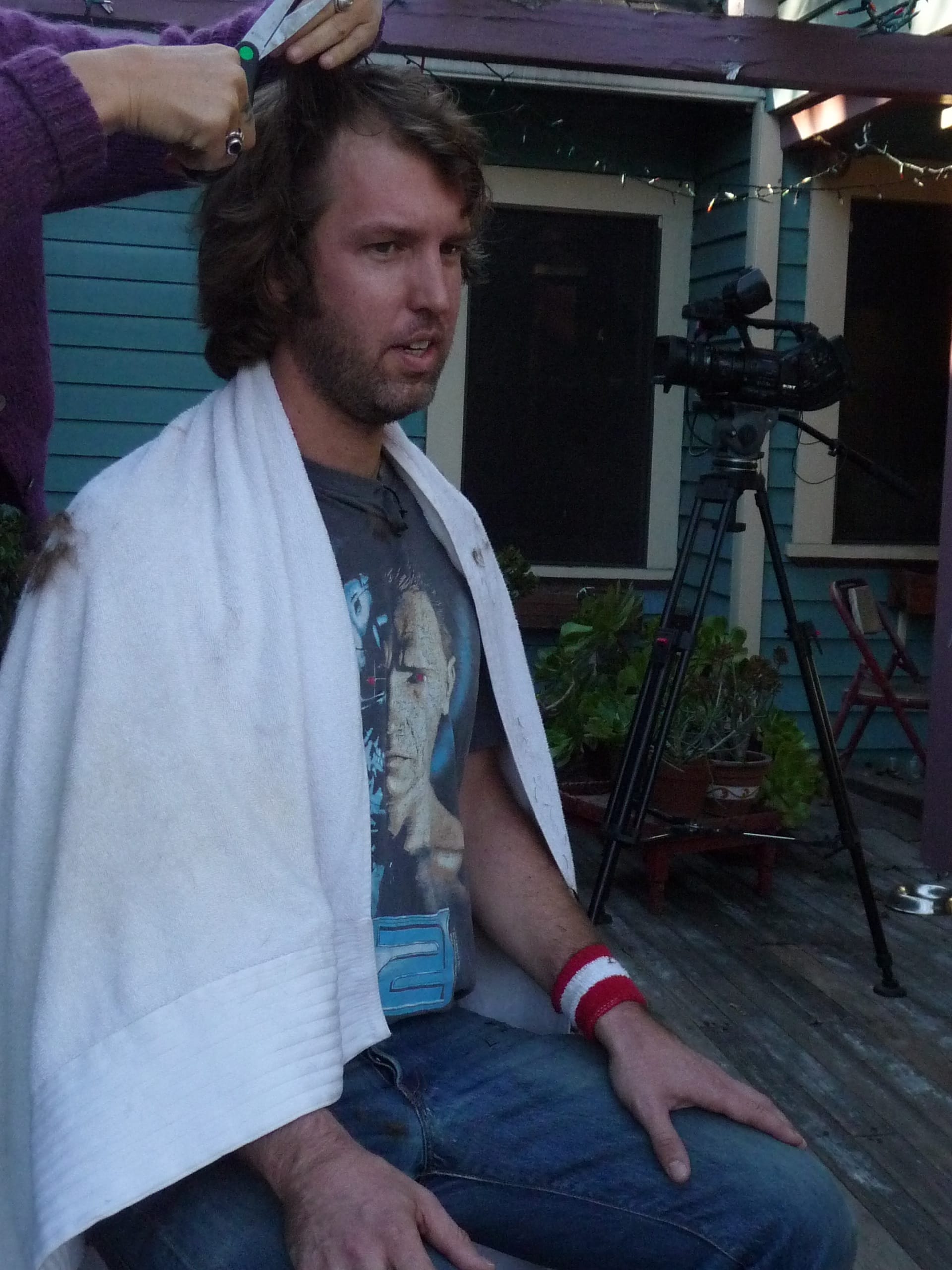 Marc gets his hair trimmed for The Advice of Strangers.