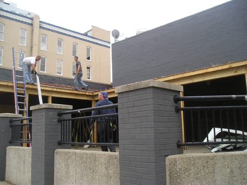 people walking on structures