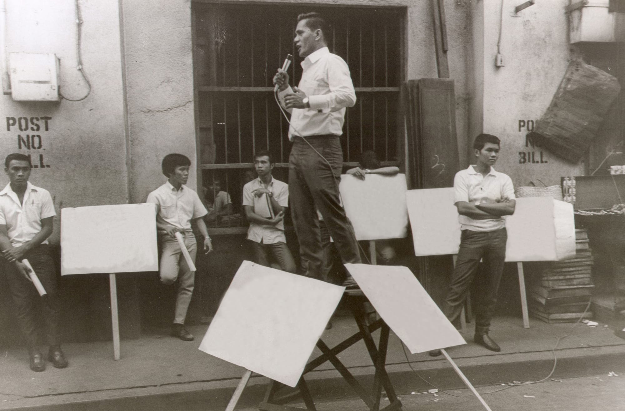 Erased Slogans, a series of photographs Dalena exhibited at the Lopez Museum in Manila.