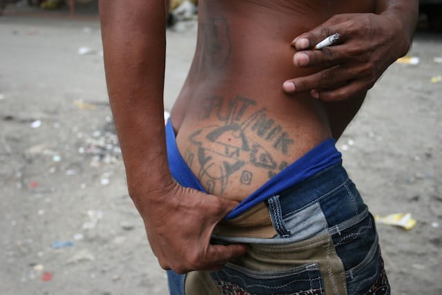 A prisoners' tattoo depicts Sputnik. From Griggs's Kalabet Peynge series. 