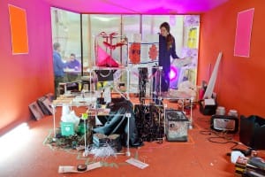 Megan Cotts works on adding objects to the archive structure. Photo by Emily Wynns.