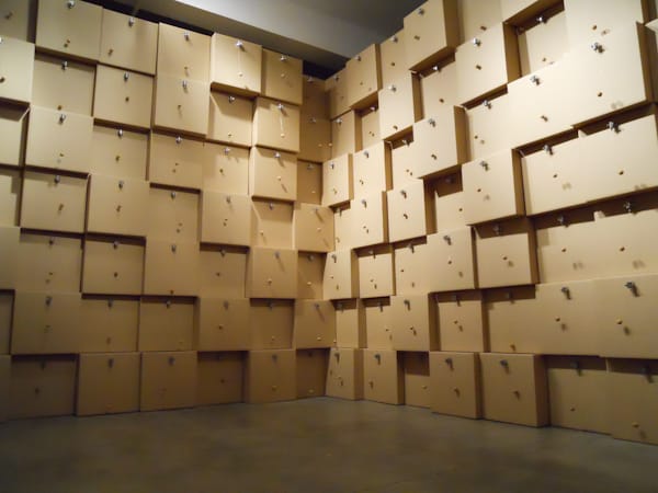 Zimoun, "294 prepared dc-motors, cork balls, cardboard boxes 41x41x41cm"