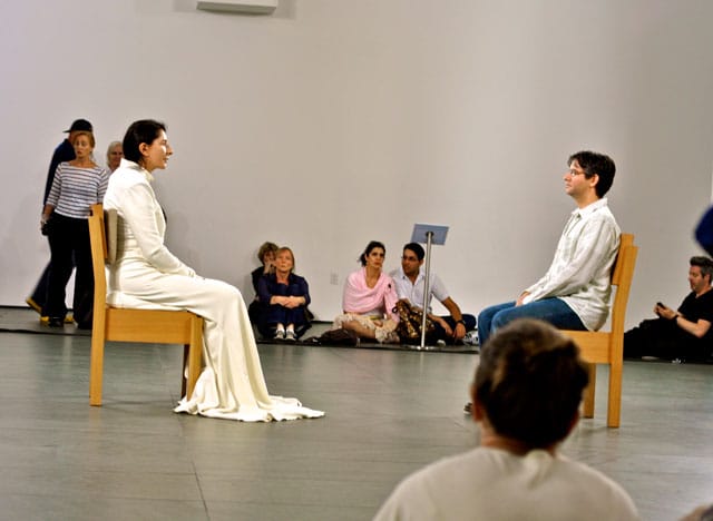 Marina Abramović performing during her retrospective at MoMA