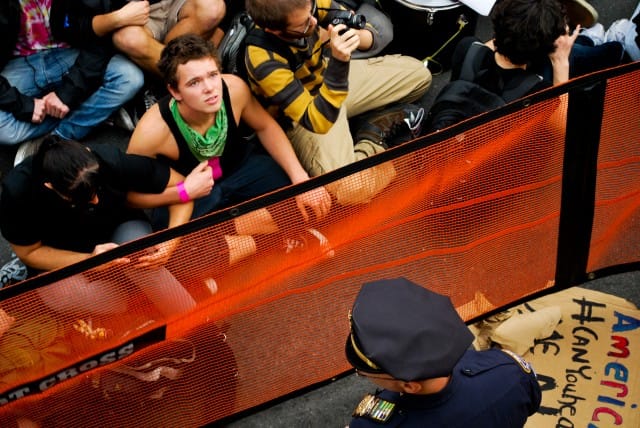 Occupiers about to be arrested along with 700 others on the Brooklyn Bridge. Photo by author.
