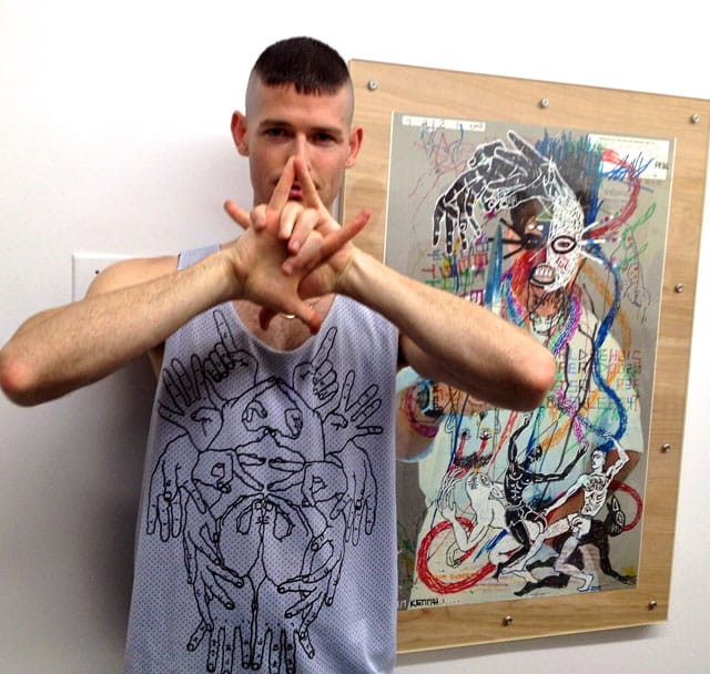 Artist Brian Kenny with his work