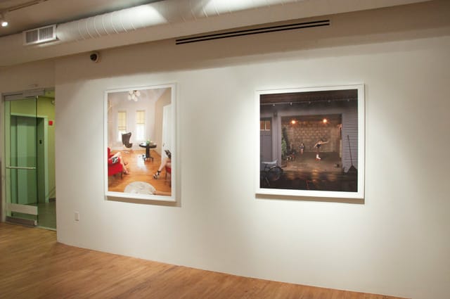 Installation view, Julie Blackmon, "Day Tripping," at Robert Mann Gallery. Left: "Book Club" (2012); right: "Garage" (2012)