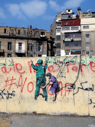 Graffiti on Cairo's Mohamed Mahmoud Street (image via Flickr/sierragoddess) (click to enlarge)