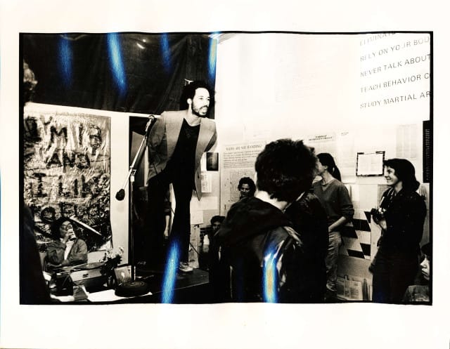 Joe Lewis performance at 5 Bleecker Street as a part of the exhibition “Income and Wealth,” 1979. (Courtesy Coleen Fitzgibbon)