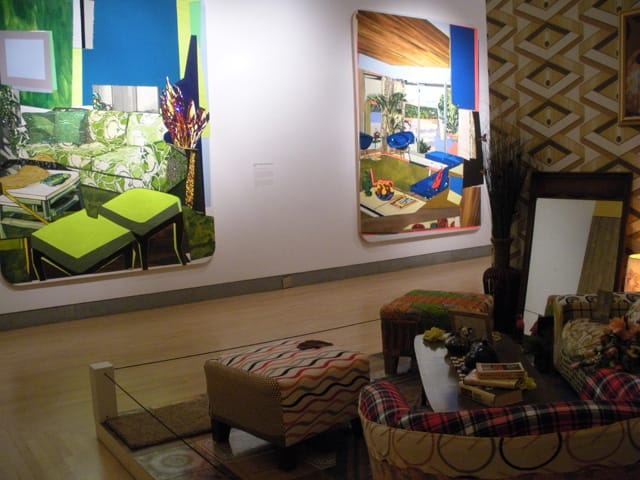 A part of one of Thomas's sets, with two of her interior paintings in the background
